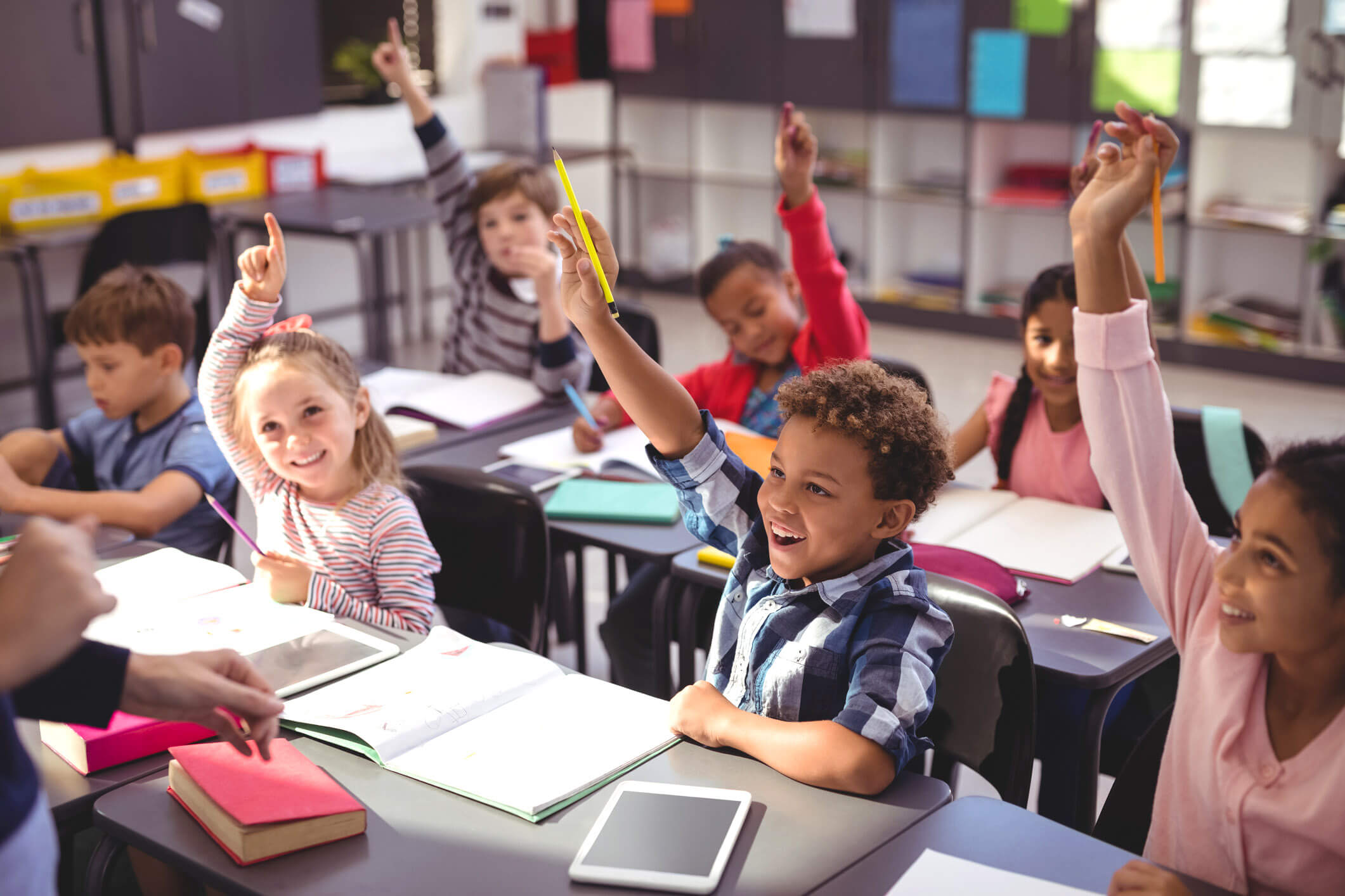 Classroom of children with workbooks