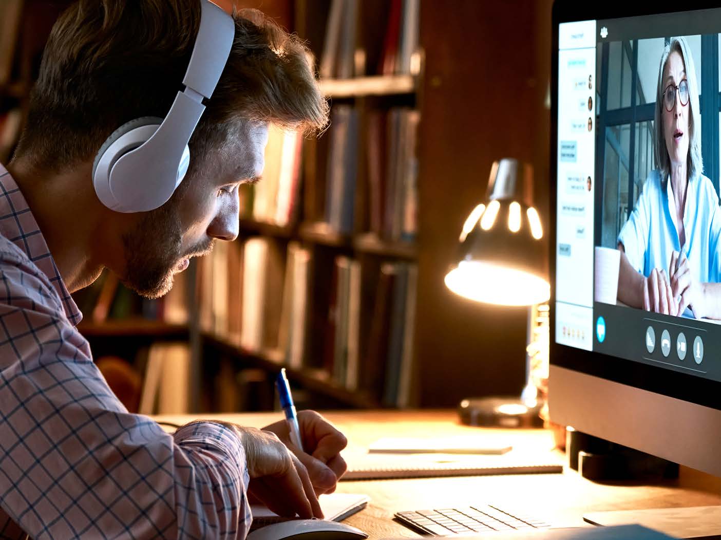 xanedu-flexed-student-online-computer-with-headphones